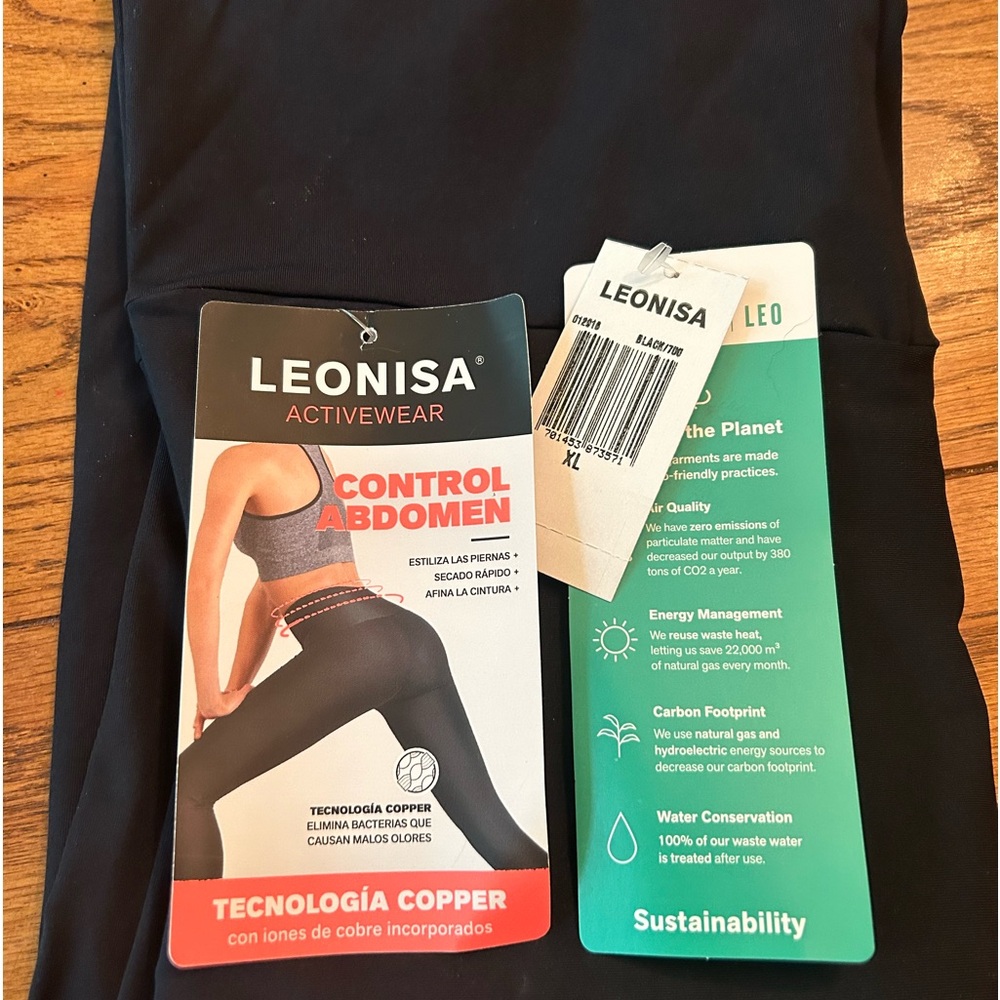 Tummy sculpting active wear leggings .